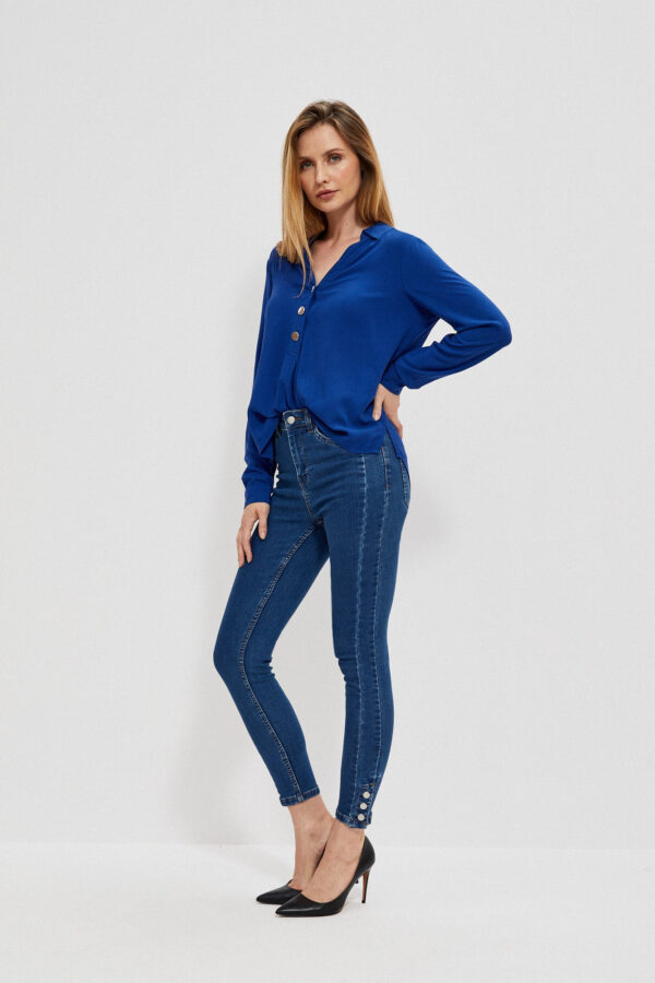 Jeansy rurki z ozdobnymi guzikami