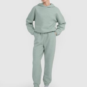 4F Bluza dresowa z waflowej dzianiny damska - turkusowa