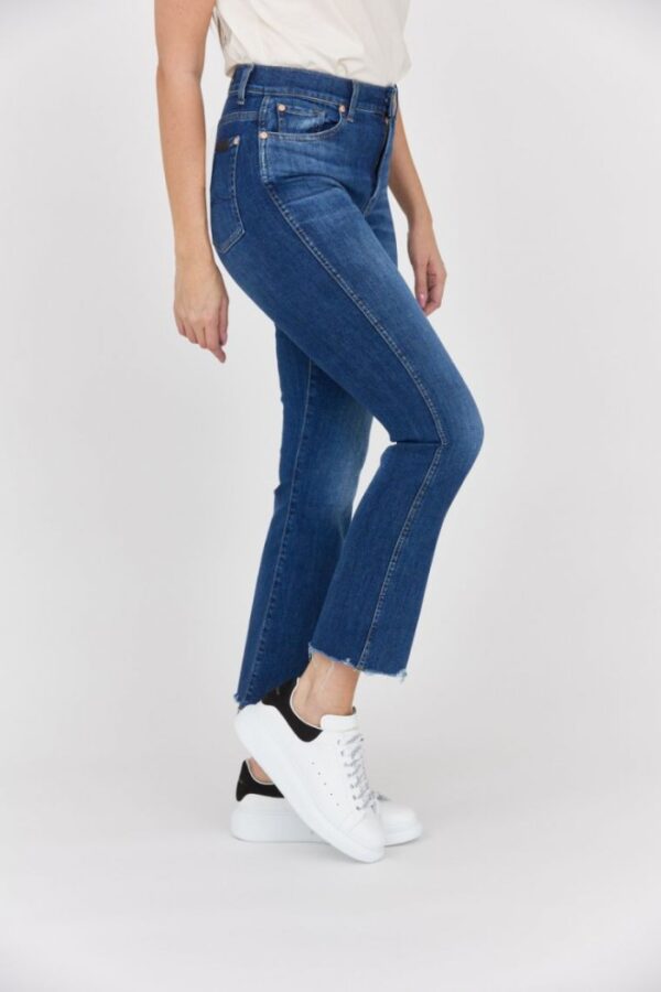 7 FOR ALL MANKIND Ciemnoniebieskie jeansy damskie z poszarpanymi nogawkami HW Slim Kick