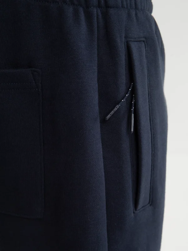 0c113938d033a1ae500e14d5d7a9aa29676acb0c Szorty męskie dresowe wiązane w pasie granatowe Kersyner 403