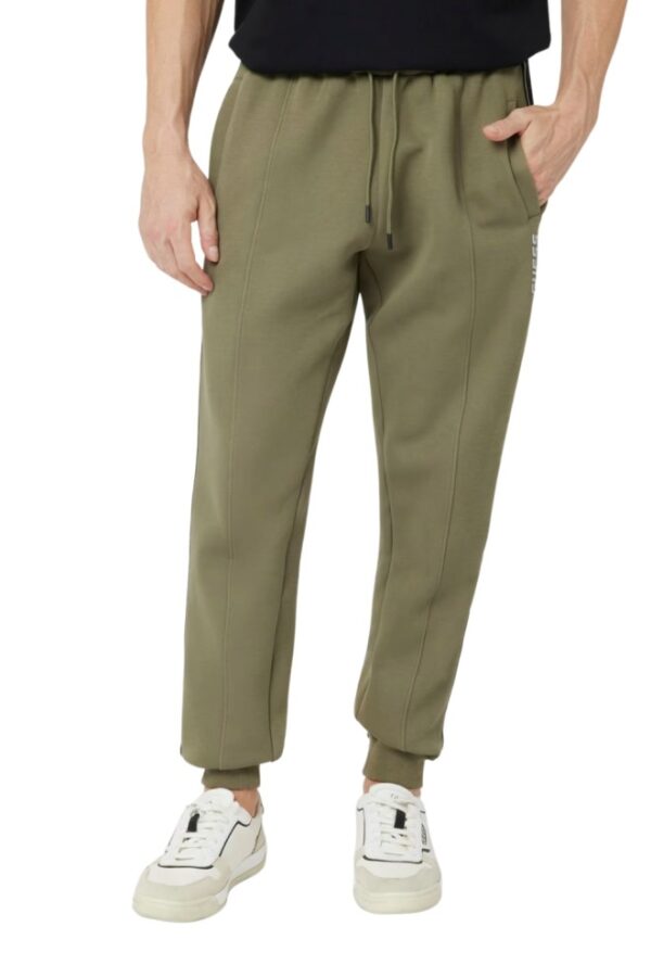 GUESS Zielone męskie spodnie dresowe z lampasami Mickey