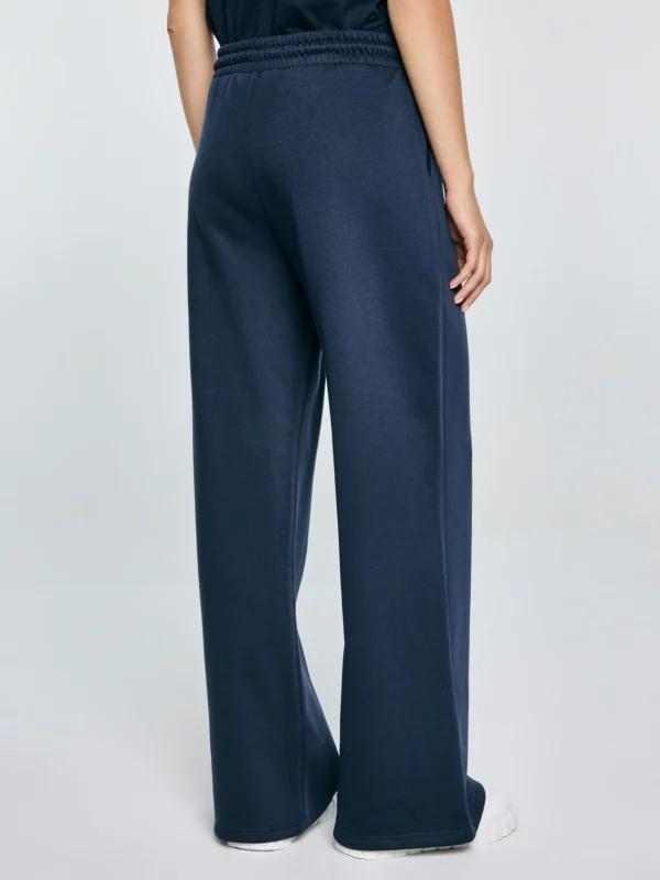 47e68d6f68b0cbab56ca82fe89f6ce04579bf0a0 Spodnie damskie dresowe wide granatowe Madelinap 403