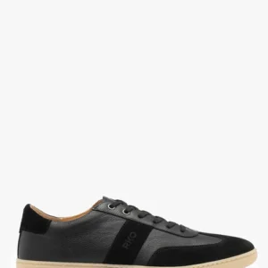 Czarne skórzane trampki męskie na jasnym spodzie