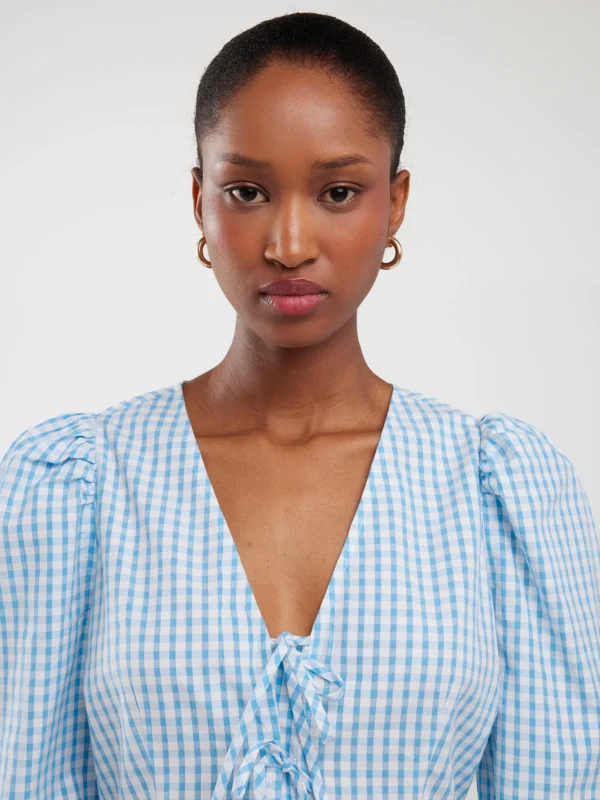 Bluzka damska z baskinką w drobną kratkę niebieska Sori 401