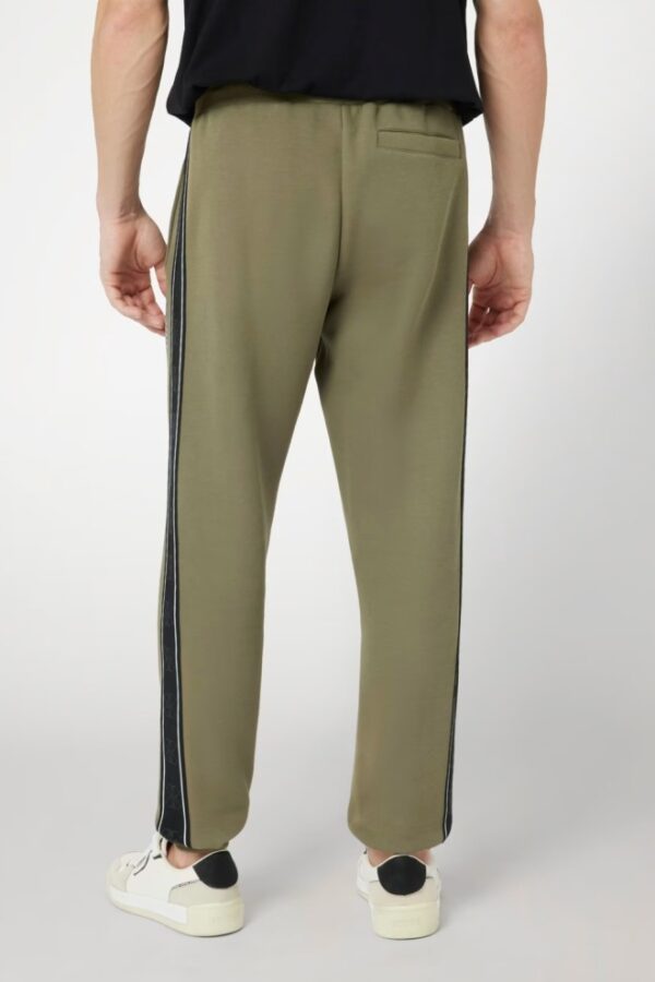 GUESS Zielone męskie spodnie dresowe z lampasami Mickey