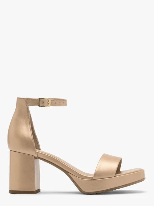 Złote sandały na masywnym obcasie i balu