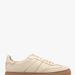 Kremowe półbuty sportowe na ciemnobeżowym spodzie