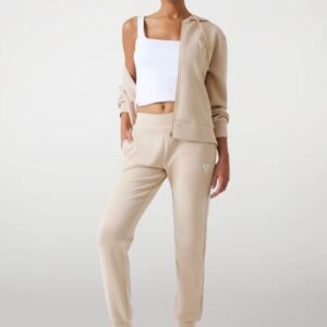 GUESS Spodnie damskie dresowe w kolorze taupe Olympe