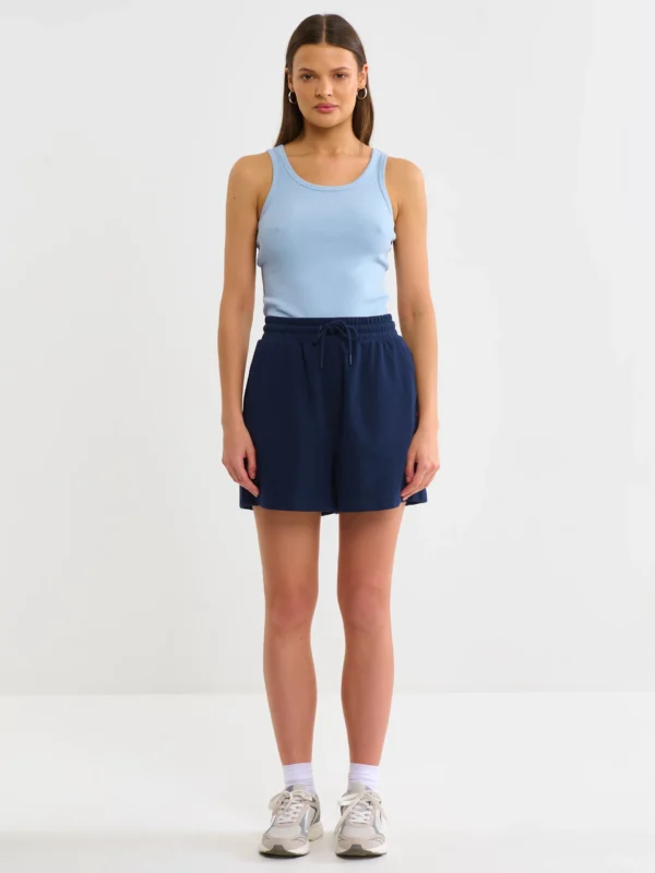 9d6fe6a56fa0d37aec8db3098d3de5fd40172857 Koszulka damska na ramiączkach prążkowana błękitna Aurela 400