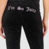JUICY COUTURE Czarne welurowe spodnie dresowe damskie z haftowanymi wisienkami