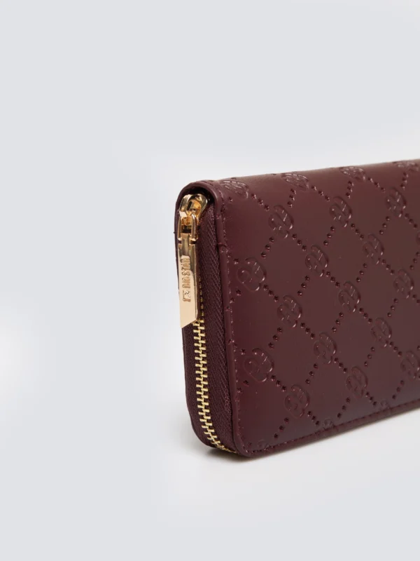 d43a7b6b6e33923385aa2f25d860e3d4a2a1e7d7 Portfel damski z ozdobnym tłoczeniem bordowy Lisetto 604
