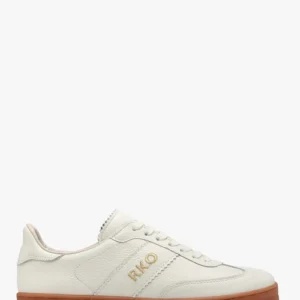 Białe półbuty sportowe w na beżowym spodzie