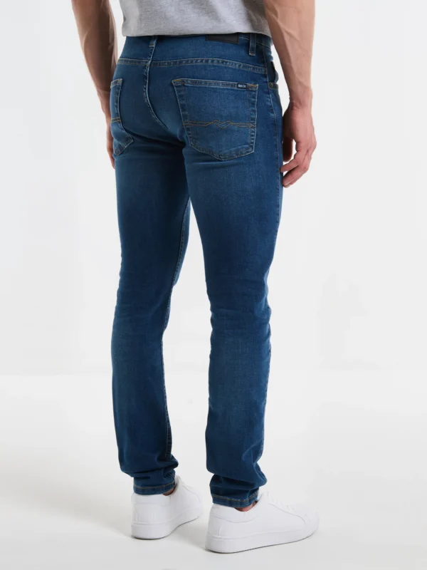 ed18e72f29e4625ee395c83eb0006ef739164327 Jeansy męskie skinny niebieskie Deric 303