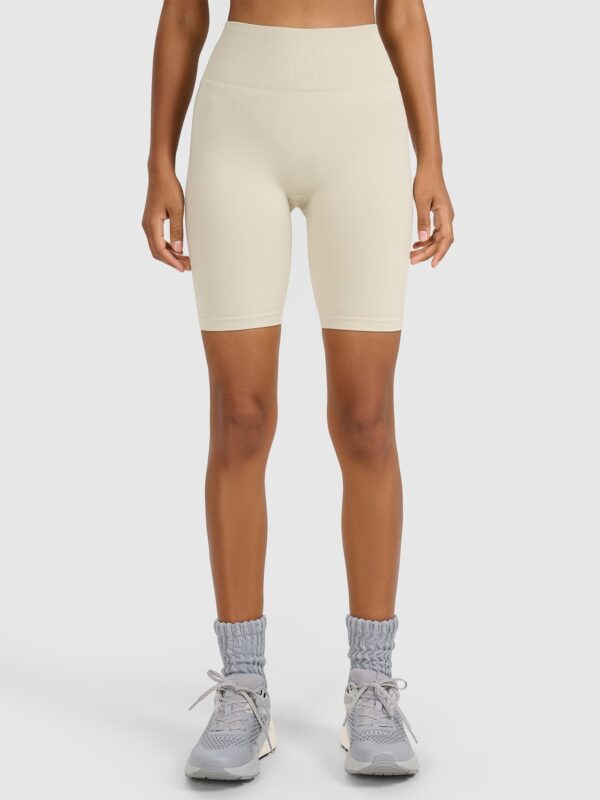 4F Legginsy kolarki treningowe bezszwowe damskie - beżowe
