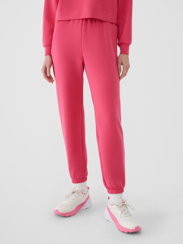 4F Spodnie dresowe joggery z modalem damskie - różowe