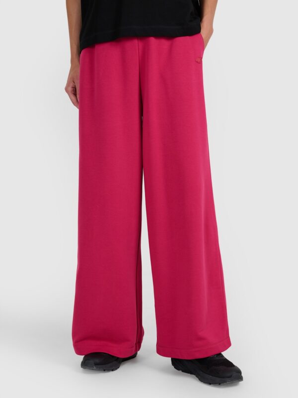 4F Spodnie dresowe z szerokimi nogawkami damskie - różowe