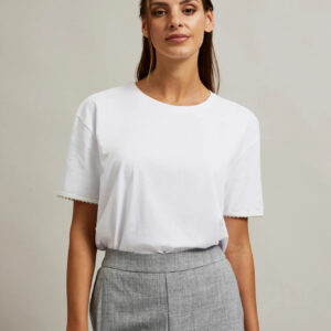 Bluzka z koralikami na rękawach biała