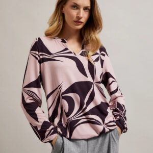 Sweter z geometrycznym wzorem różowy