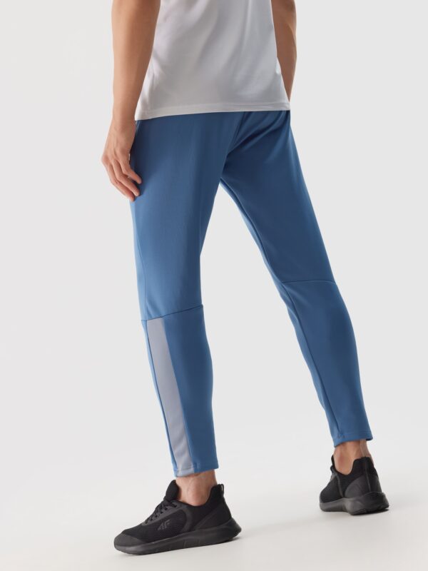 4F Spodnie treningowe szybkoschnące męskie - niebieskie