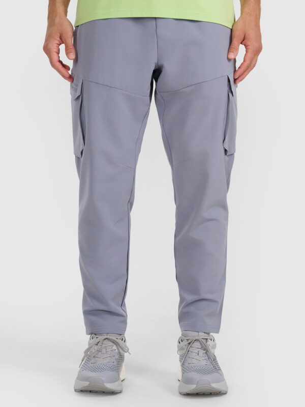 b74a802a6ef246e64e81c8d5e0d976d8d5832973 4F Spodnie treningowe szybkoschnące męskie - niebieskie