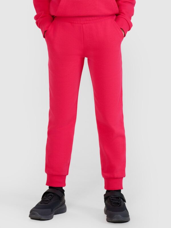 bbfb30b461fc30f7795d6f9ca1461b7f52ce5a69 4F Spodnie dresowe joggery dziewczęce - różowe 122 (6-7 lat)