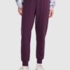 4F Spodnie dresowe joggery damskie - fioletowe