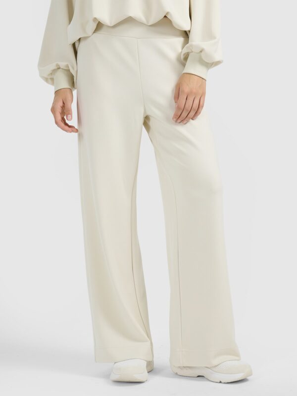 4F Spodnie dresowe z szerokimi nogawkami z modalem damskie - beżowe