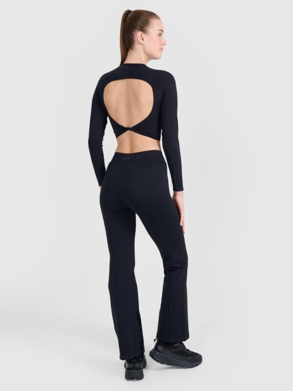 4F Spodnie treningowe bezszwowe z rozszerzanymi nogawkami damskie - czarne