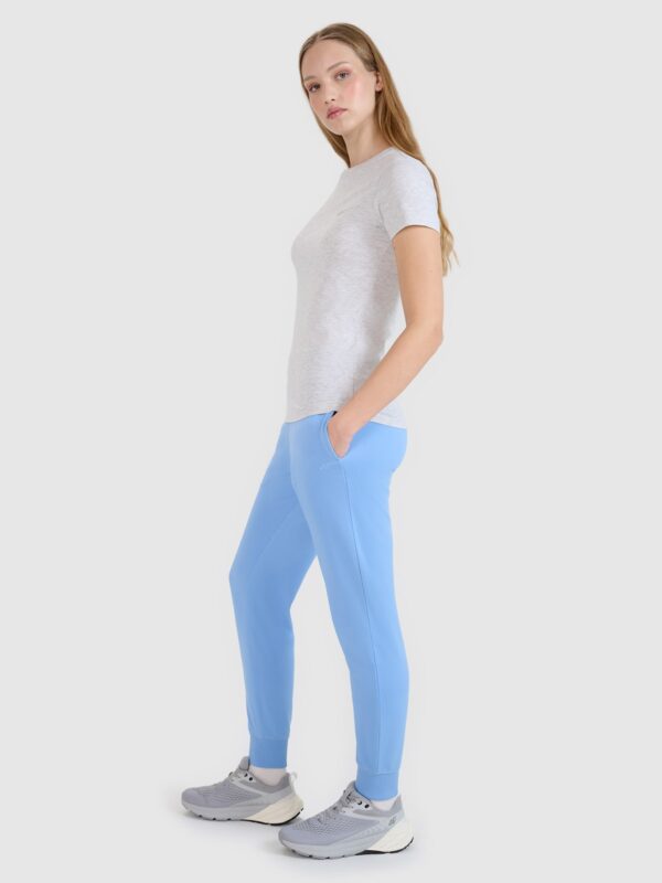 4F Spodnie dresowe joggery damskie - niebieskie