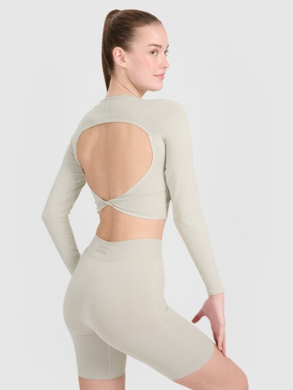 4F Longsleeve treningowy crop-top z wycięciem na plecach damski - beżowy