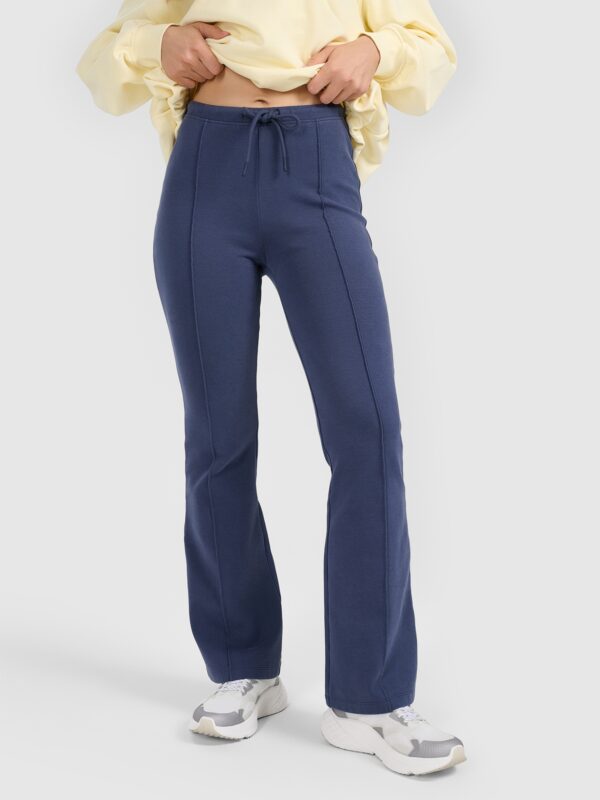4F Spodnie dresowe z rozszerzanymi nogawkami damskie - granatowe