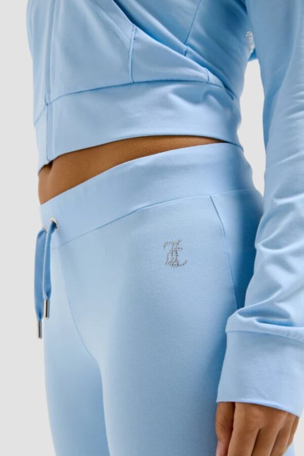 JUICY COUTURE Błękitne damskie spodnie dresowe Single Jersey Apollo Low Rise