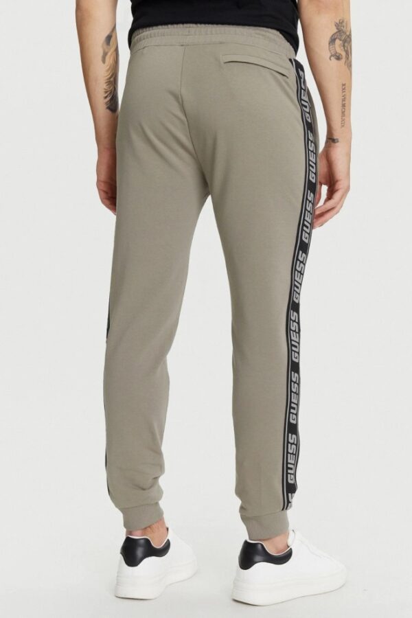 GUESS Zielone męskie spodnie dresowe z lampasami New Arlo