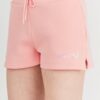 GUESS Brzoskwiniowe szorty damskie z kolorowym logo