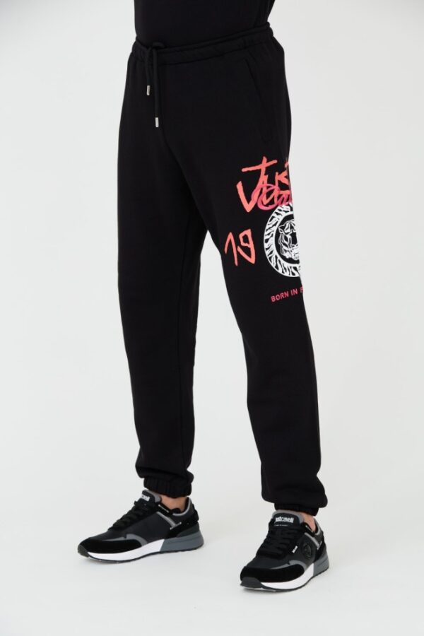 JUST CAVALLI Czarne męskie spodnie z nadrukiem R 1998 Dripp
