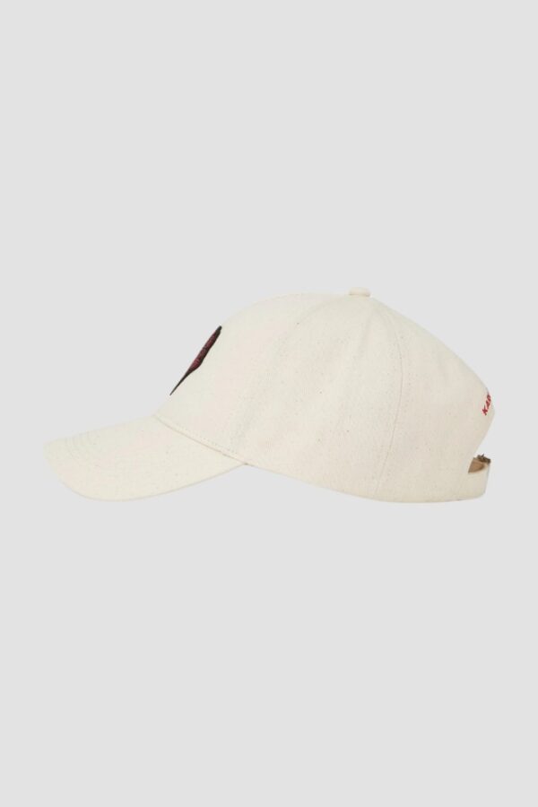 703c44db6c64341245c3764dfe86f3c092b5811d KARL LAGERFELD Beżowa damska czapka z daszkiem z serce