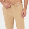 782314e24b4d9d8d7985617af2a9350cbfffd817 7 FOR ALL MANKIND Beżowe spodnie męskie jogger Chino