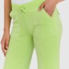 JUICY COUTURE Klasyczne welurowe spodnie dresowe damskie del ray w jasnozielonym kolorze