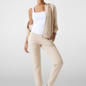 82325fbde422a05ec625ed0e979794b6407461ac GUESS Damska bluza w kolorze taupe Olympe