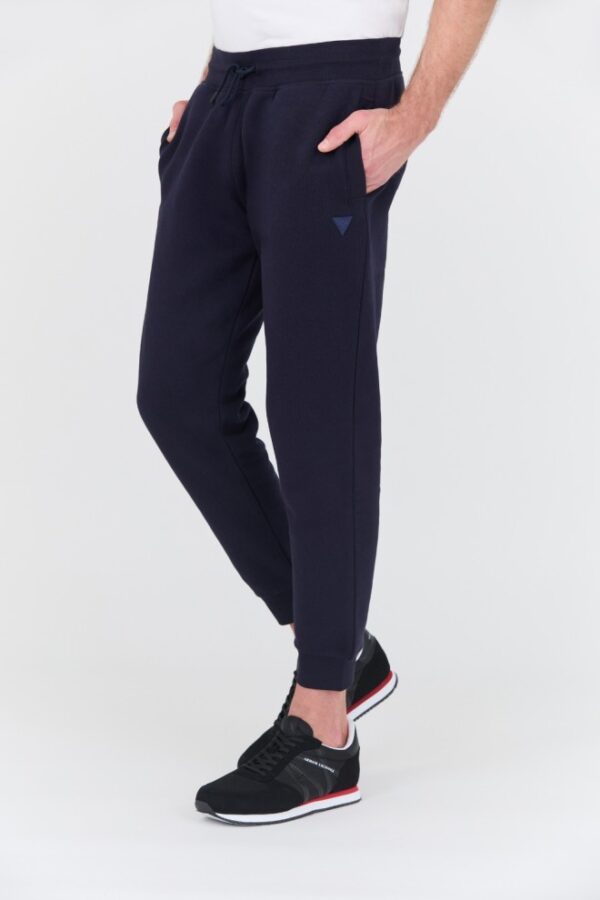 GUESS Granatowe męskie spodnie dresowe Aldwin