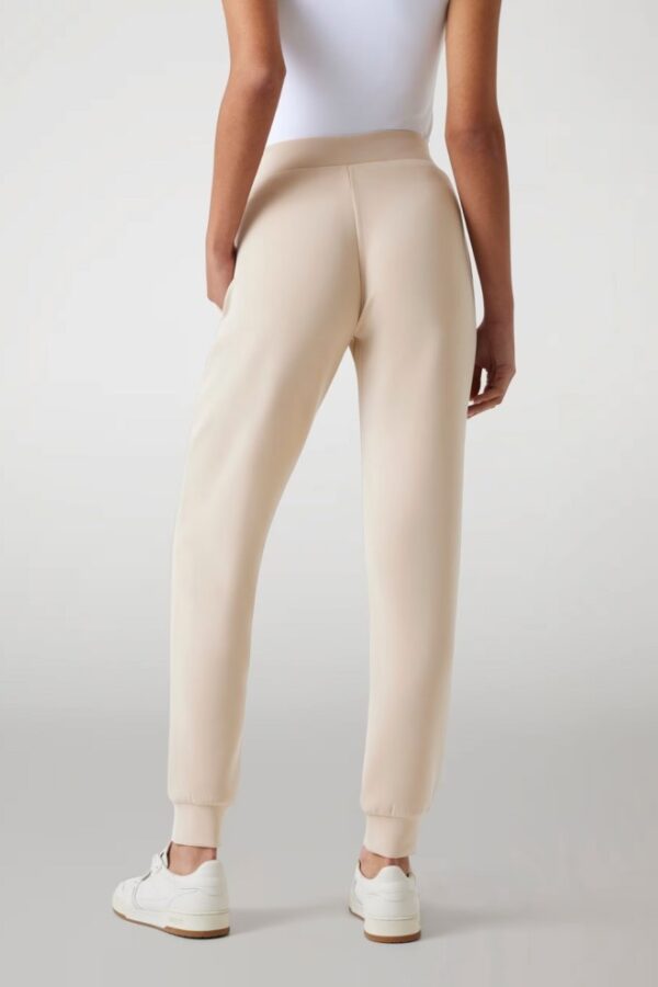 GUESS Spodnie damskie dresowe w kolorze taupe Olympe