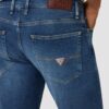 GUESS Niebieskie męskie spodnie jeansowe Finnley