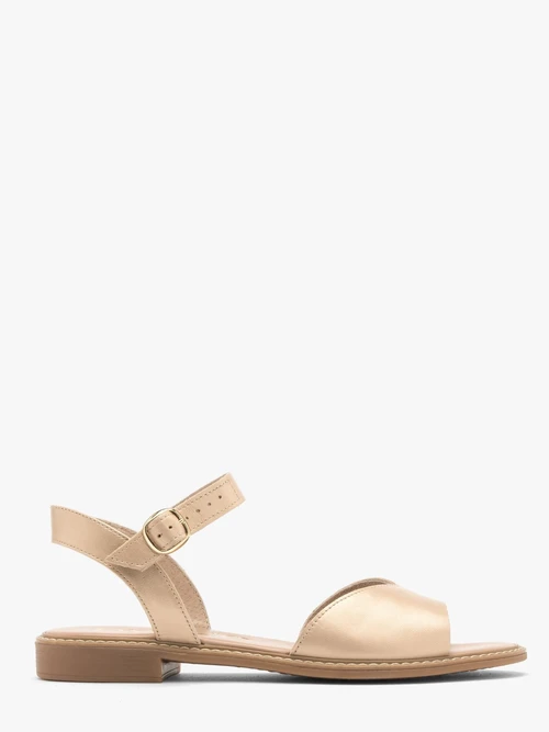 Złoty sandał z ozdobną cholewką