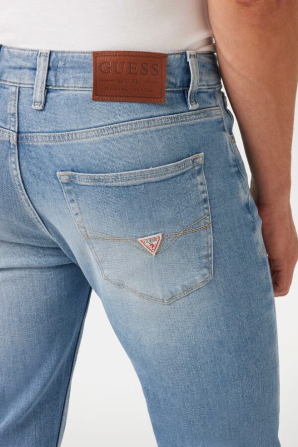 GUESS Błękitne męskie spodnie jeansowe Angels