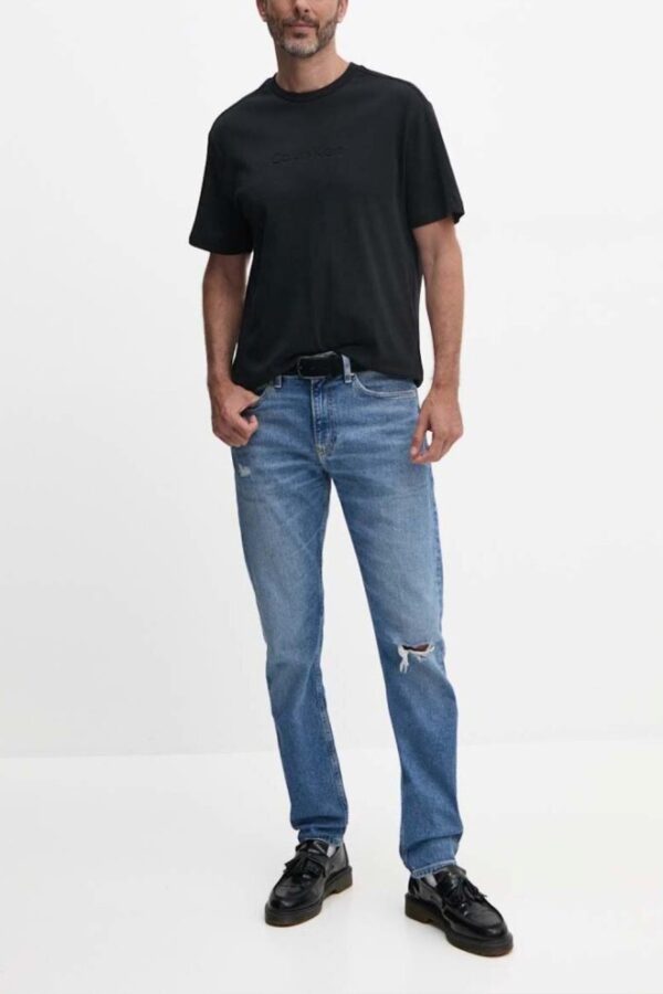 d60a48e9e6b90abd62fa3539feb6c472a4cc619c CALVIN KLEIN Błękitne męskie jeansy Slim Taper