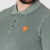 f09077b091b213925526b179a3d48b073e047dfe GUESS Zielona męska koszulka polo z pomarańczowym logo